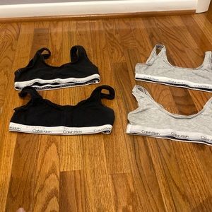 Selling 4 bras -2 black /2 gray.  Size 10/12 Large- good for preteen